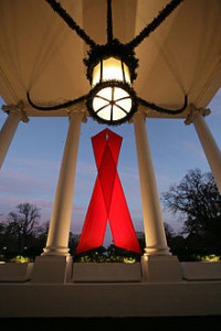 Red ribbon display at the White House in 2007 on World AIDS day - AIDS / HIV is a terrible disease and affliction - Does silver provide a treatment or cure?